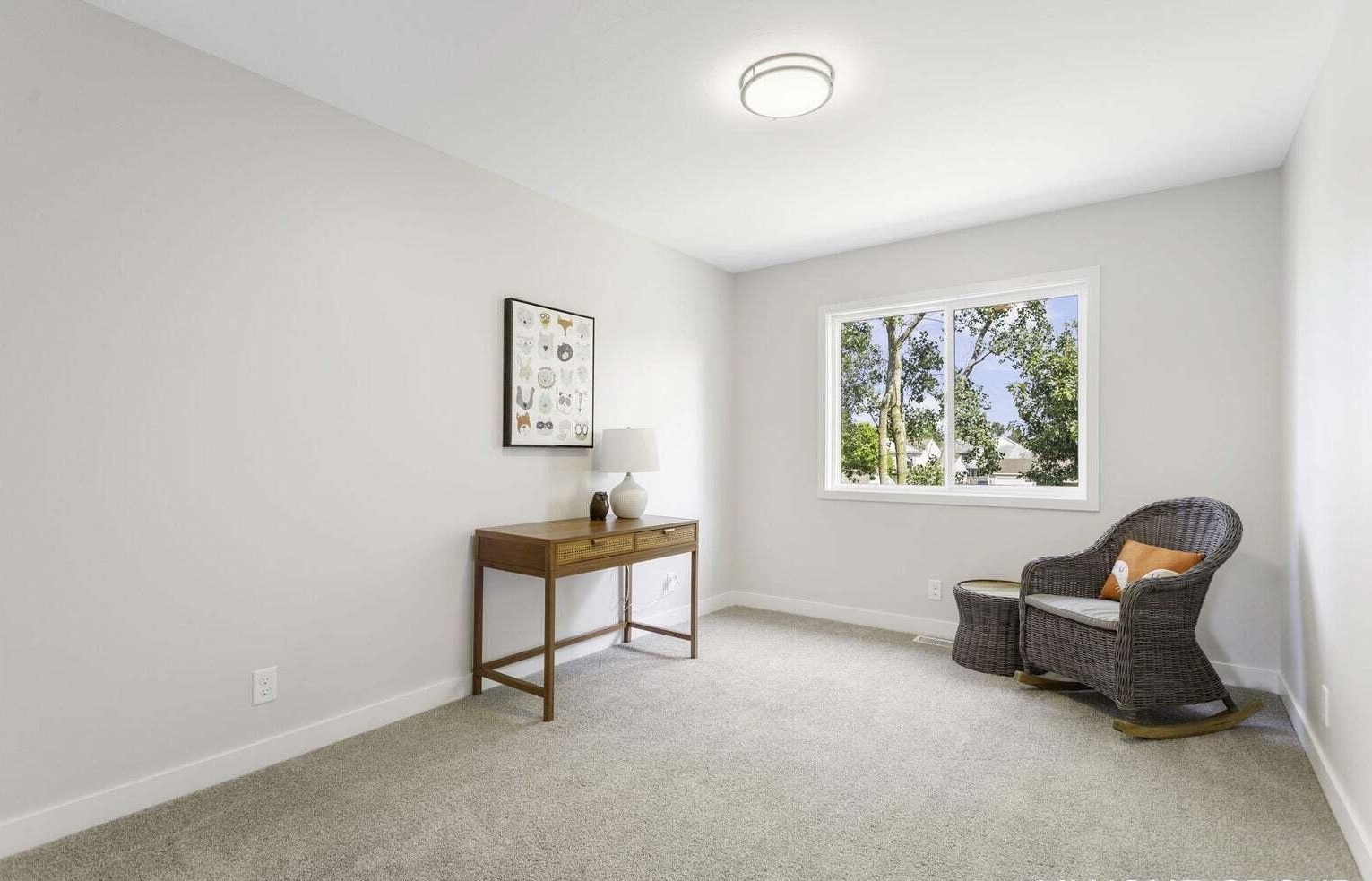 Bright flex room ideal for a home office in a Signature Estates townhome
